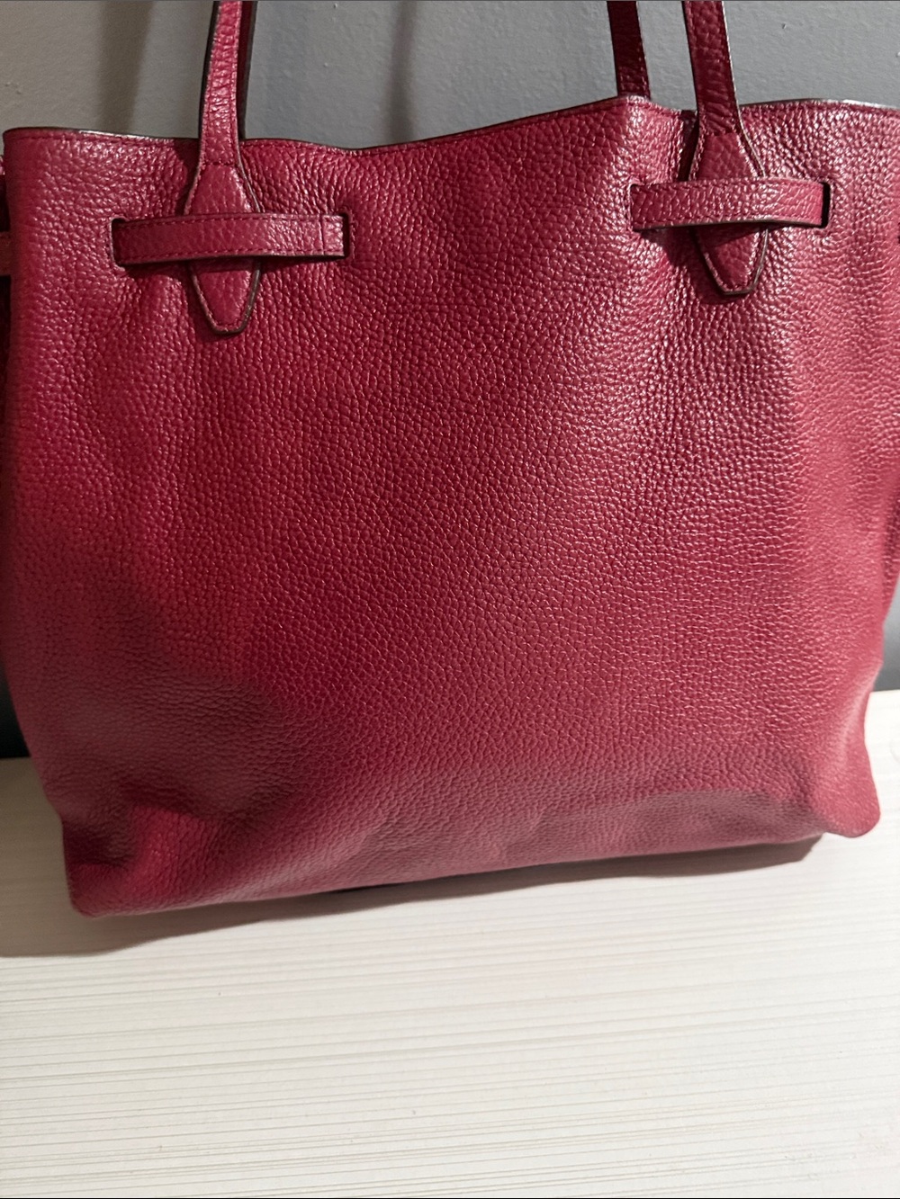 Henri Bendel tote bag features a pebbled texture and gold-toned hardware. - Picture 7 of 11